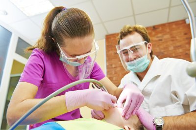 Dentists checking the patient