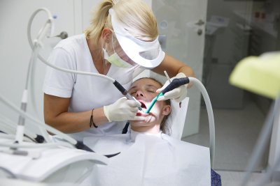 Dentist treating the patient