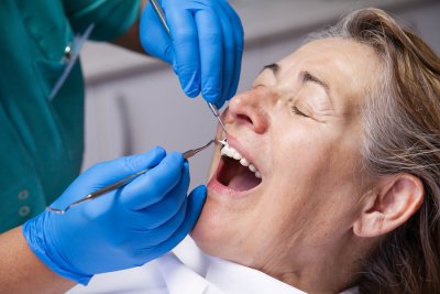 Dentist treating the patient