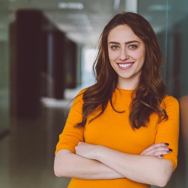 smiling woman wearing orange