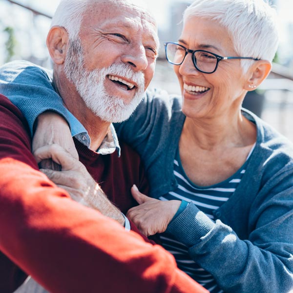 laughing middle aged couple