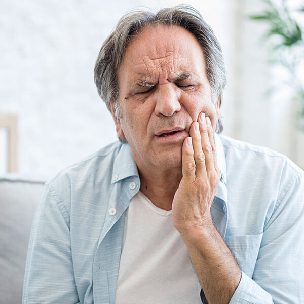 man with tooth pain