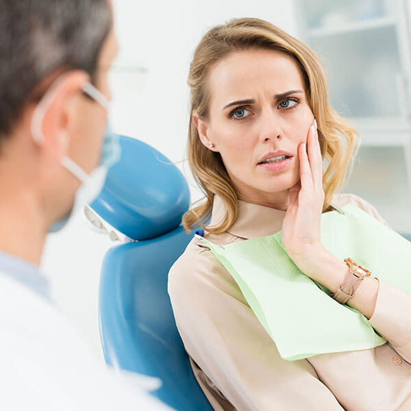 woman with jaw pain