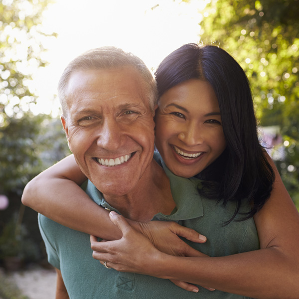 smiling middle age couple