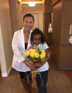 dr thuy nguyen dentist with patient